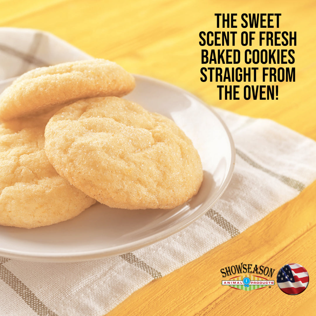 Sugar Cookies on a plate on a table. Words say, "The Sweet Scent of Fresh Baked Cookies Straight from the Oven!"